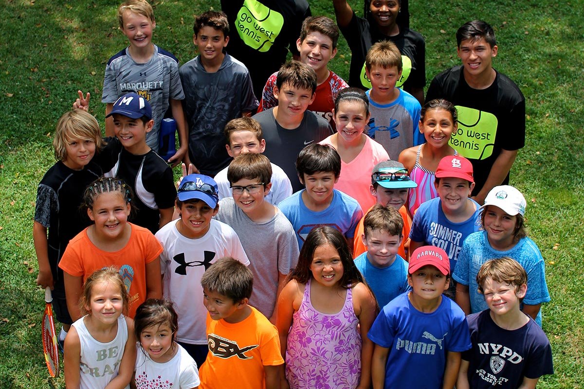 A Group Of People Posing For Picture